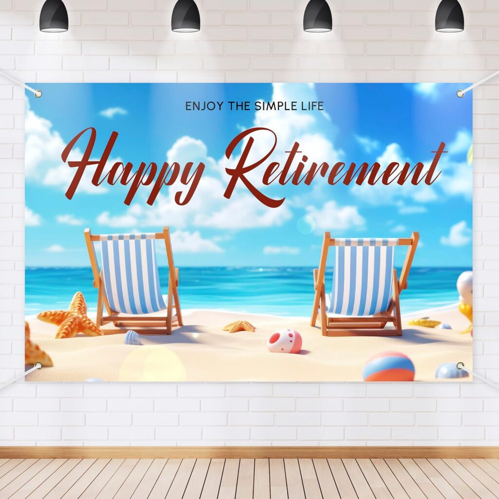 A beach scene banner with two striped deck chairs on sand, seashells, and beach toys. Blue sky and ocean in the background. Text reads: Enjoy the simple life. Happy Retirement. Banner is hung on a white brick wall.
